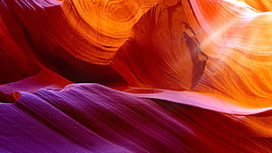 Vivid Antelope Canyon Slot Walls With Dramatic Sunbeams And Flowing Sandstone Textures HD wallpaper