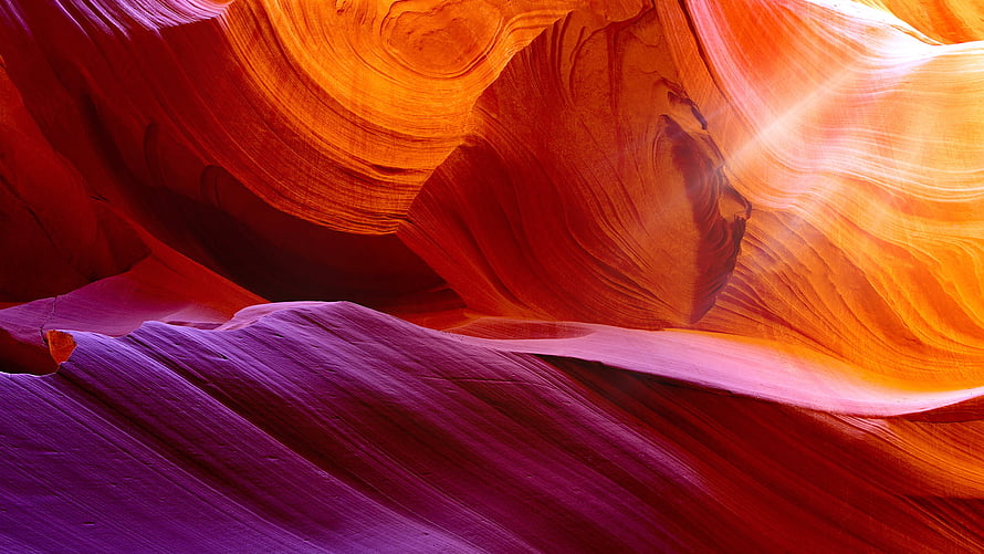 Vivid Antelope Canyon Slot Walls With Dramatic Sunbeams And Flowing Sandstone Textures HD wallpaper