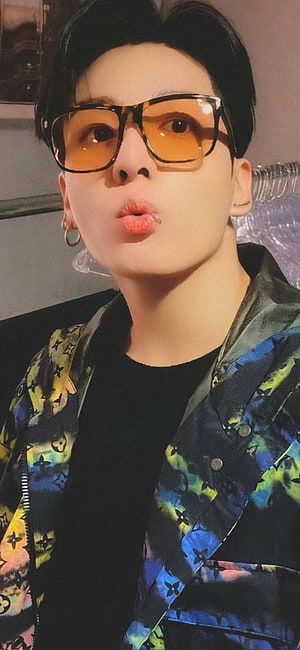 Jungkook from BTS Wearing Orange Tinted Glasses and Colorful Patterned Jacket HD phone wallpaper