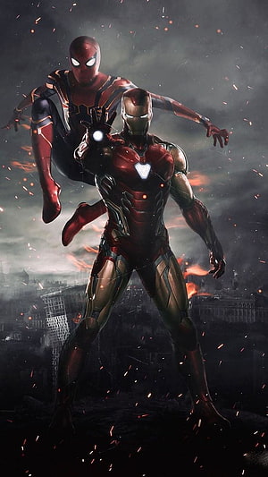 Iron Man and Spider-Man in Dramatic Battle Pose Amidst Burning City Ruins HD phone wallpaper