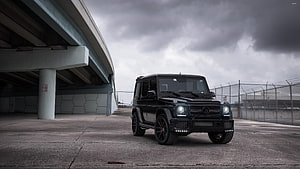 Black Mercedes-Benz G-Class SUV Parked Under Concrete Overpass HD wallpaper
