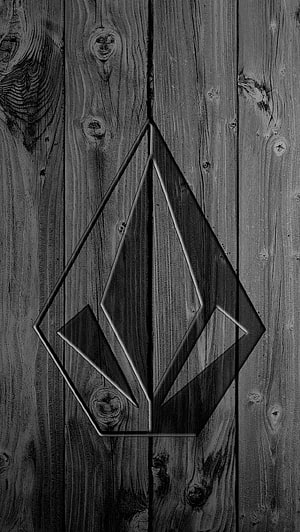Volcom Stone Logo Engraved on Dark Weathered Wood Planks HD phone wallpaper