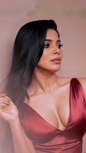 Divya Bharti in a deep red satin gown with long dark hair and soft studio lighting HD phone wallpaper