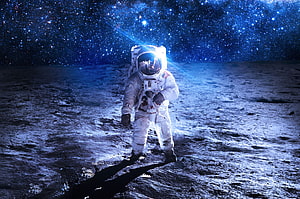Astronaut Standing on Lunar Surface Under Starry Night Sky HD wallpaper