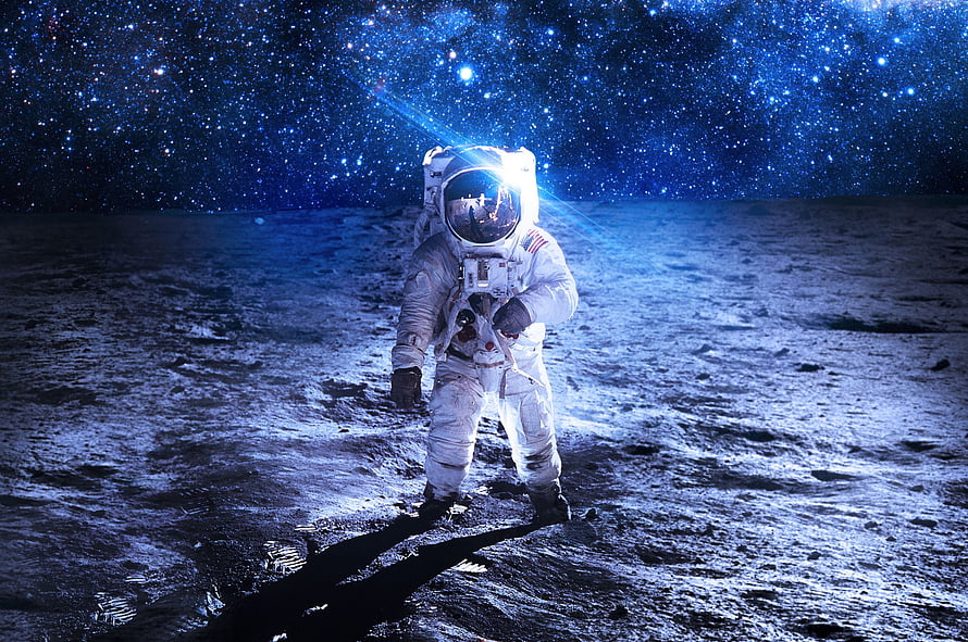 Astronaut Standing on Lunar Surface Under Starry Night Sky HD wallpaper
