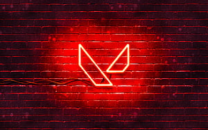 Valorant Neon Logo Glowing on Red Brick Wall HD wallpaper
