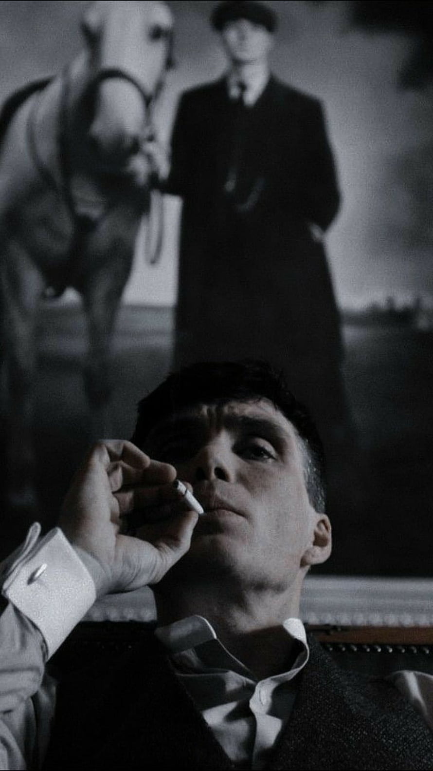 Tommy Shelby from Peaky Blinders Smoking a Cigarette in a Dimly Lit Room HD phone wallpaper