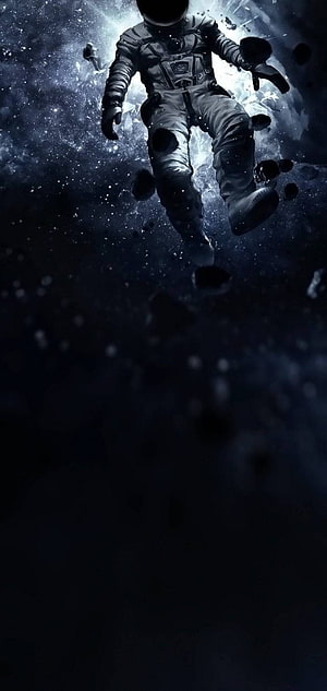 Astronaut Floating in Deep Space with Dark Nebula and Cosmic Debris HD phone wallpaper