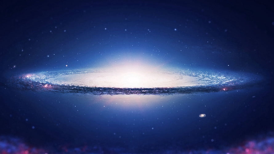 Majestic Spiral Galaxy with Bright Core and Star-Scattered Deep Space Background HD wallpaper