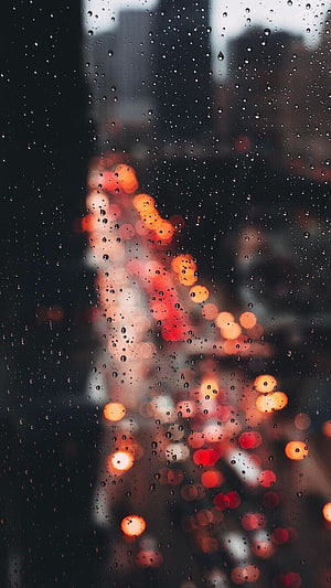 Rainy Night Cityscape Through Wet Glass With Bokeh Lights HD phone wallpaper