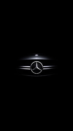 Mercedes-Benz Grille Emblem Illuminated Against a Dark Background HD phone wallpaper