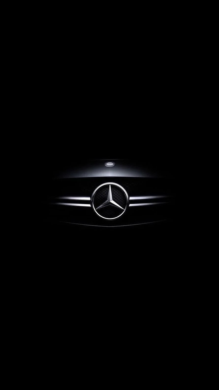 Mercedes-Benz Grille Emblem Illuminated Against a Dark Background HD phone wallpaper
