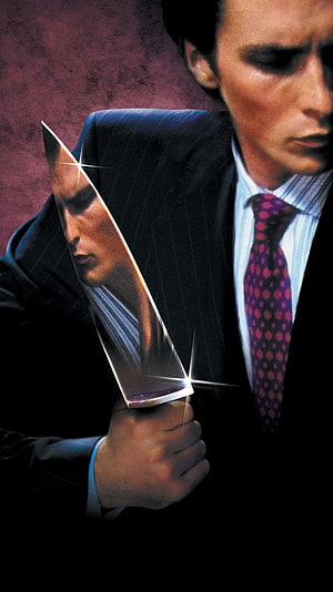 Patrick Bateman from American Psycho holding a knife in a dark suit, American Psycho (2000) , Patrick Bateman HD phone wallpaper