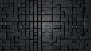 Dark 3D Cube Grid Texture with Subtle Central Highlight and Geometric Depth HD wallpaper