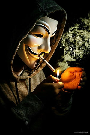 Anonymous Guy Fawkes Mask Wearing Hoodie Lighting Cigarette in Dark HD phone wallpaper