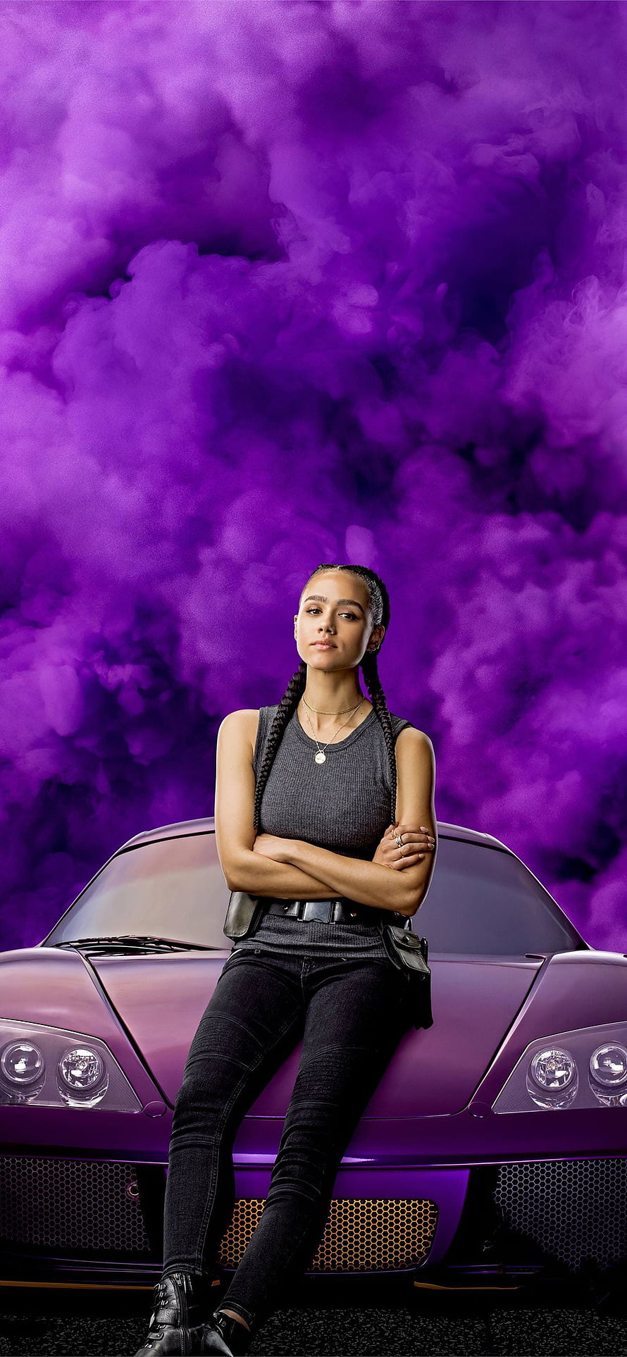 Ramsey from Fast and Furious 9 posing on a purple sports car with dramatic smoke background HD phone wallpaper