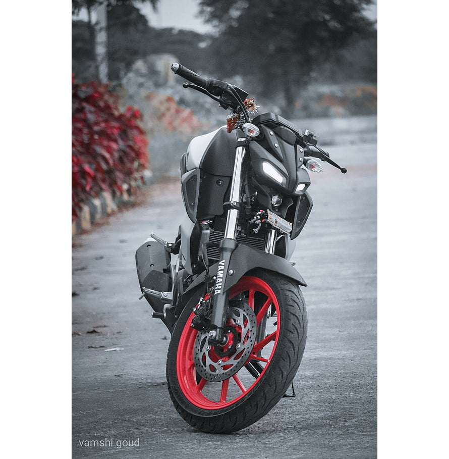 Yamaha MT-15 Motorcycle with Red Rims and Black Body on a Paved Road HD phone wallpaper
