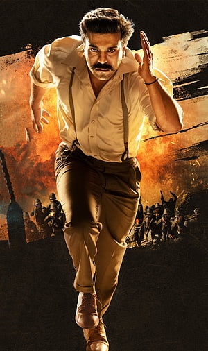 Ram Charan in RRR Action Poster with Explosive Background and Soldiers HD phone wallpaper
