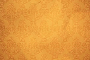 Golden Damask Pattern with Vintage Floral Motifs and Warm Textured Surface HD wallpaper