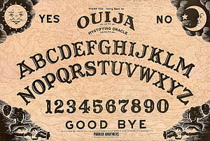 Vintage Ouija Board Design with Alphabet, Numbers, and Mystical Illustrations HD wallpaper