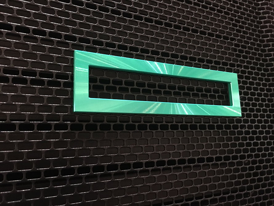 HPE Logo Badge on Black Perforated Metal Surface HD wallpaper