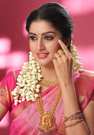 Tanya Ravichandran in a Pink Silk Saree with Traditional Gold Jewelry and Jasmine Garland HD phone wallpaper