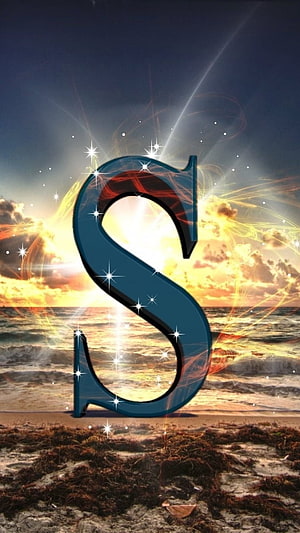 Glowing Letter S on a Beach at Sunset with Sparkling Light Effects HD phone wallpaper
