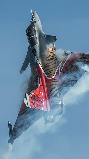 Indian Air Force Tejas Thunder Tiger Jet Performing Aerobatic Maneuver in Clear Blue Sky HD phone wallpaper