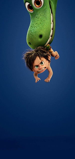 The Croods 2 Animated Scene with Guy and a Green Dinosaur Hanging Upside Down HD phone wallpaper