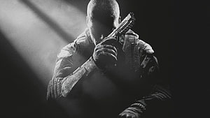 Black Ops 2 Soldier Holding Pistol in Dramatic Black and White Lighting HD wallpaper
