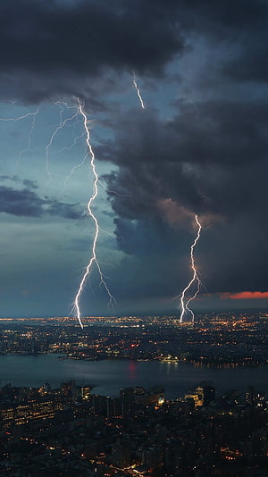 Dramatic Lightning Storm Over New York City Skyline at Night HD phone wallpaper