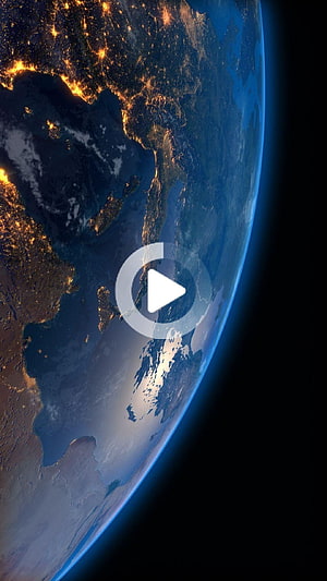 Earth at Night from Space with City Lights and Atmospheric Glow HD phone wallpaper