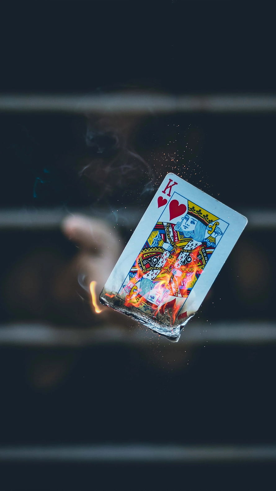 Burning King of Hearts Playing Card with Smoke and Sparks Against Dark Background HD phone wallpaper