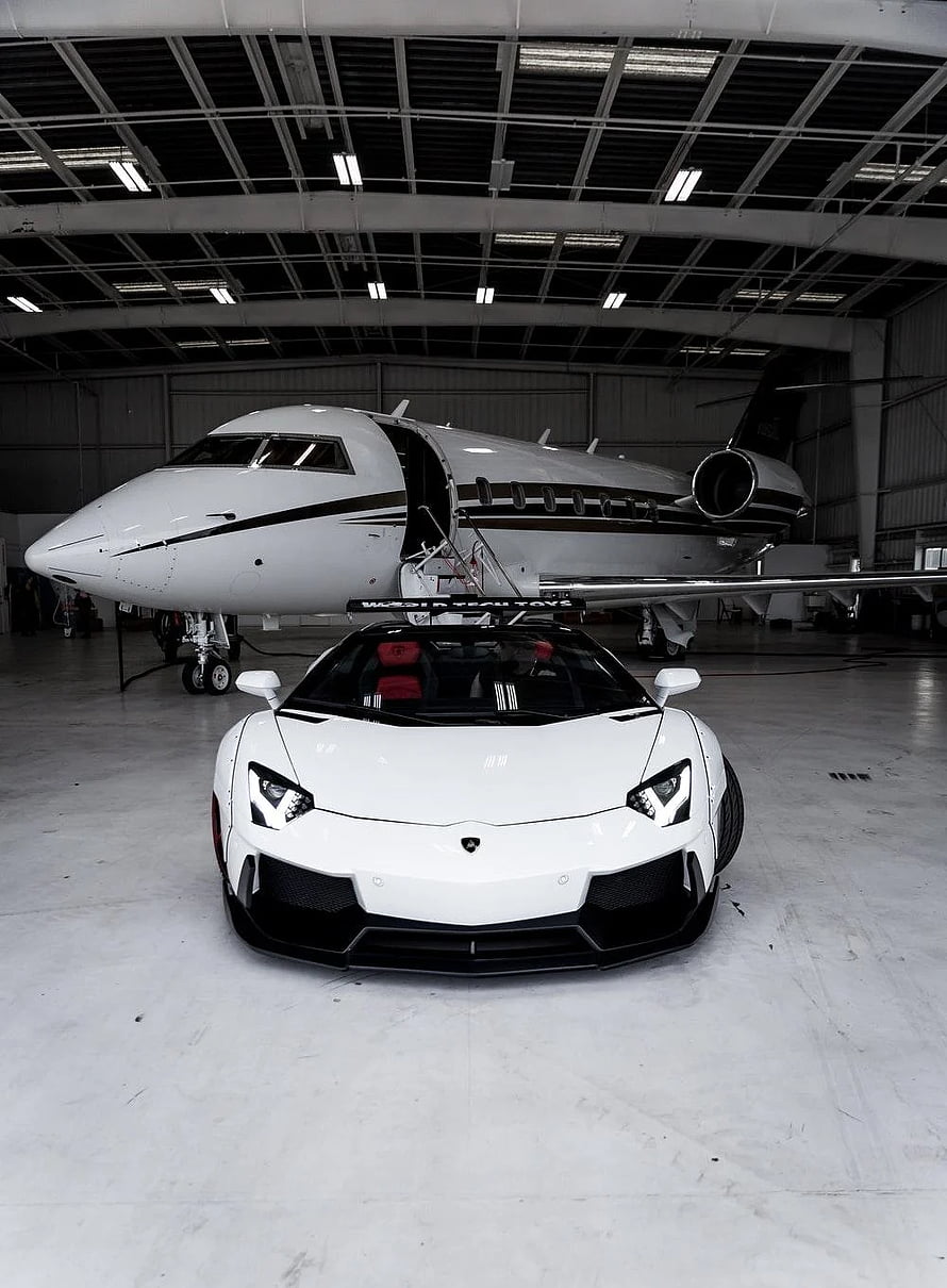 White Lamborghini Aventador SVJ Parked in Hangar with Private Jet HD phone wallpaper