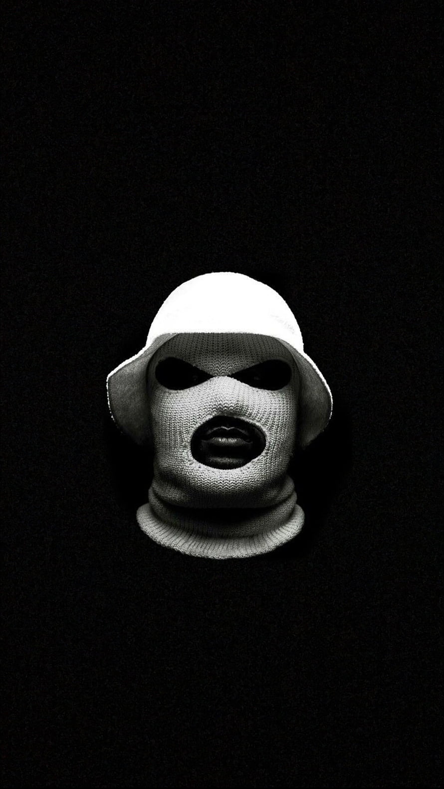 Monochrome Portrait of a Figure in a Knitted Balaclava and Bucket Hat HD phone wallpaper