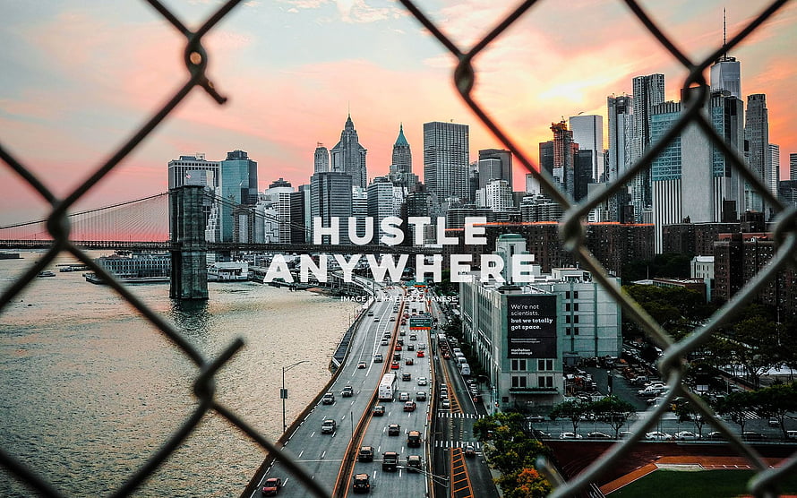 New York City Skyline at Sunset Viewed Through Chain Link Fence HD wallpaper