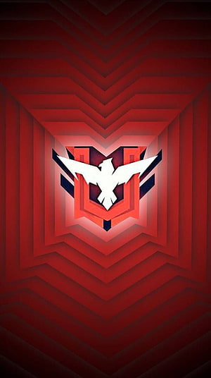 Garena Free Fire emblem centered in a deep red geometric tunnel with layered chevron patterns and dramatic lighting HD phone wallpaper
