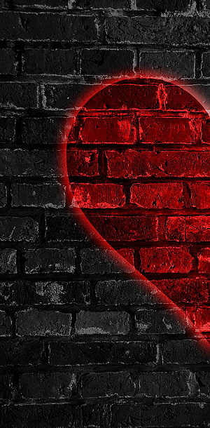 Glowing Red Heart on Dark Brick Wall with Dramatic Neon Light Effect HD phone wallpaper