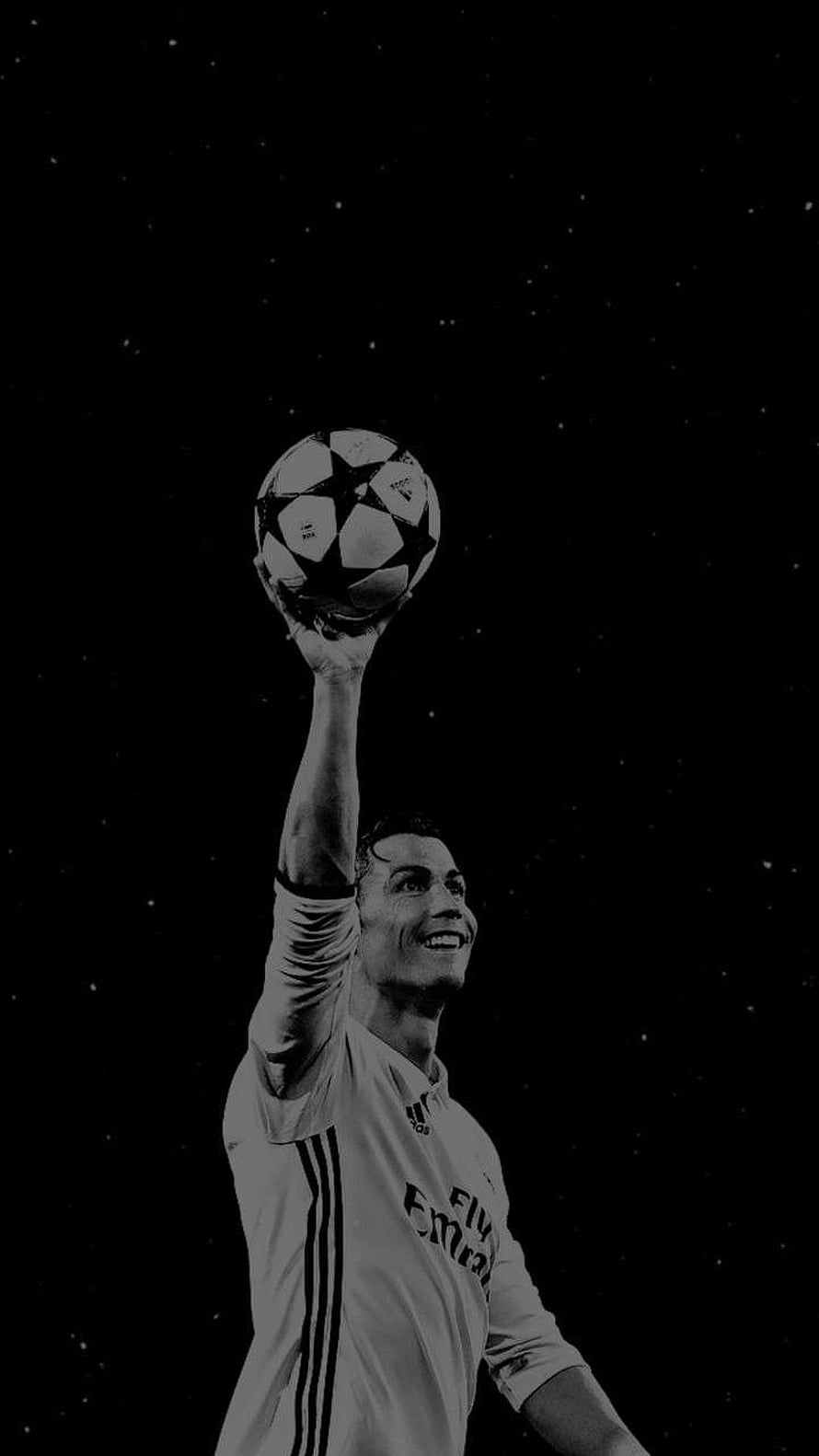 Cristiano Ronaldo Lifting Champions League Ball in Black and White HD phone wallpaper