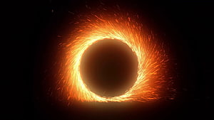Glowing Orange Fire Portal Ring with Sparks on Black Background HD wallpaper