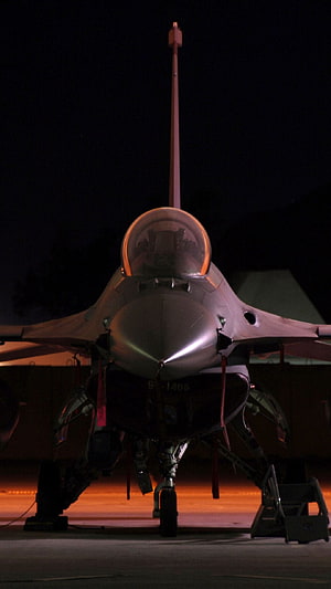 General Dynamics F-16 Fighting Falcon Front View at Night on Tarmac HD phone wallpaper