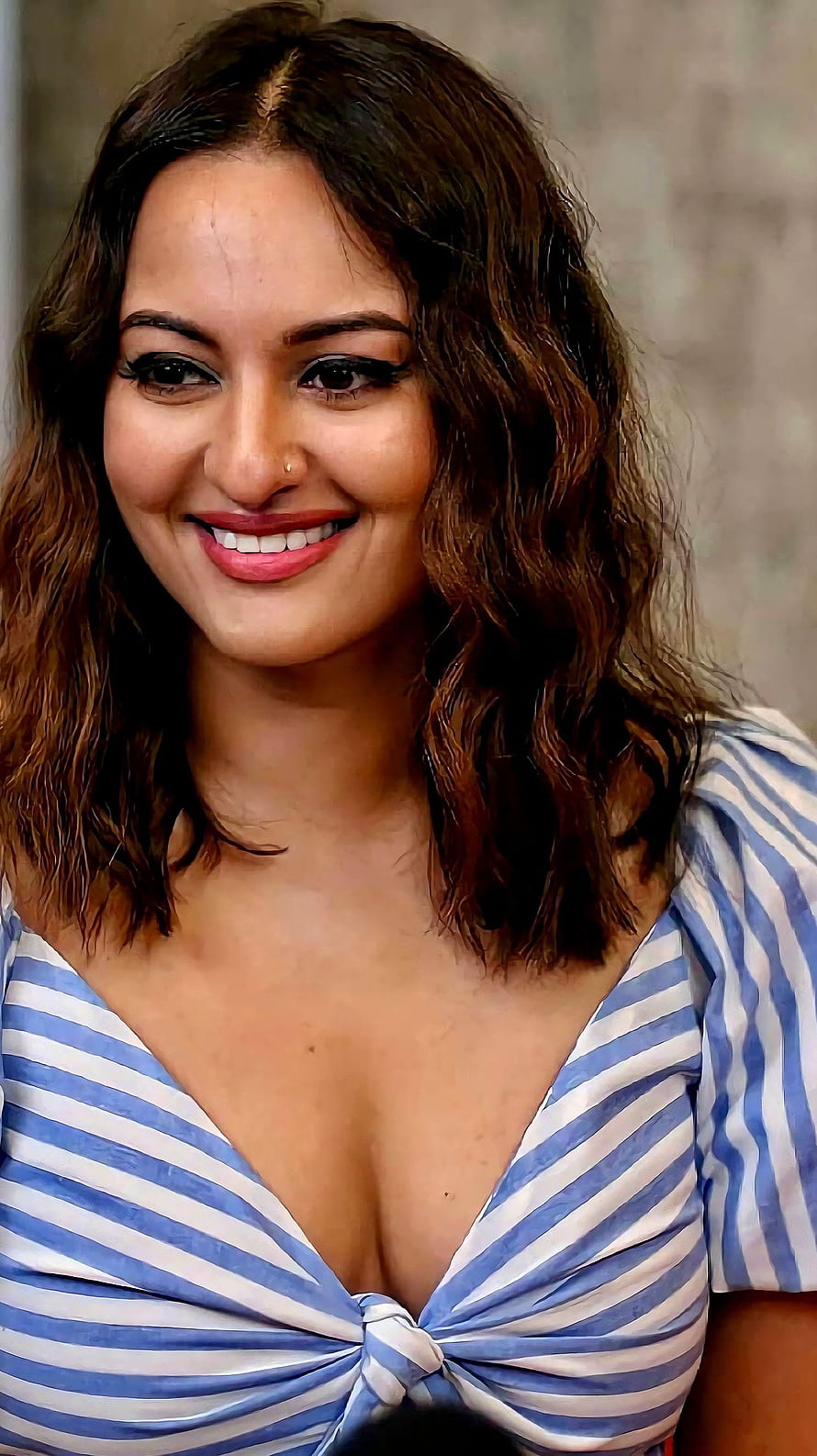 Sonakshi Sinha in a Blue and White Striped Top with a Warm Smile HD phone wallpaper