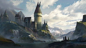 Hogwarts Castle Perched on Misty Cliffs with Waterfall and Distant Mountains HD wallpaper