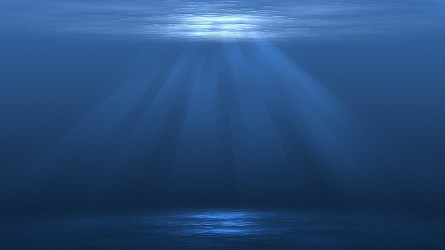 Sunlight Beams Piercing Deep Blue Ocean Water Underwater Scene HD wallpaper