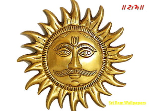 Golden Surya Devta Sun God Idol with Radiant Rays and Traditional Face HD wallpaper