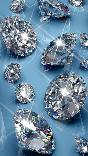 Sparkling Faceted Diamonds Scattered on a Smooth Blue Surface with Bright Starbursts HD phone wallpaper