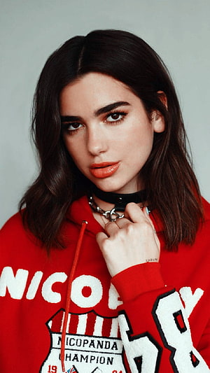 Dua Lipa in a red Nicopanda hoodie with a black choker and chain necklace HD phone wallpaper