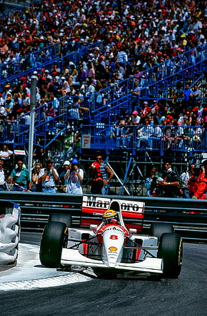 Ayrton Senna in McLaren MP4/8 at Monaco Grand Prix on narrow street circuit HD phone wallpaper