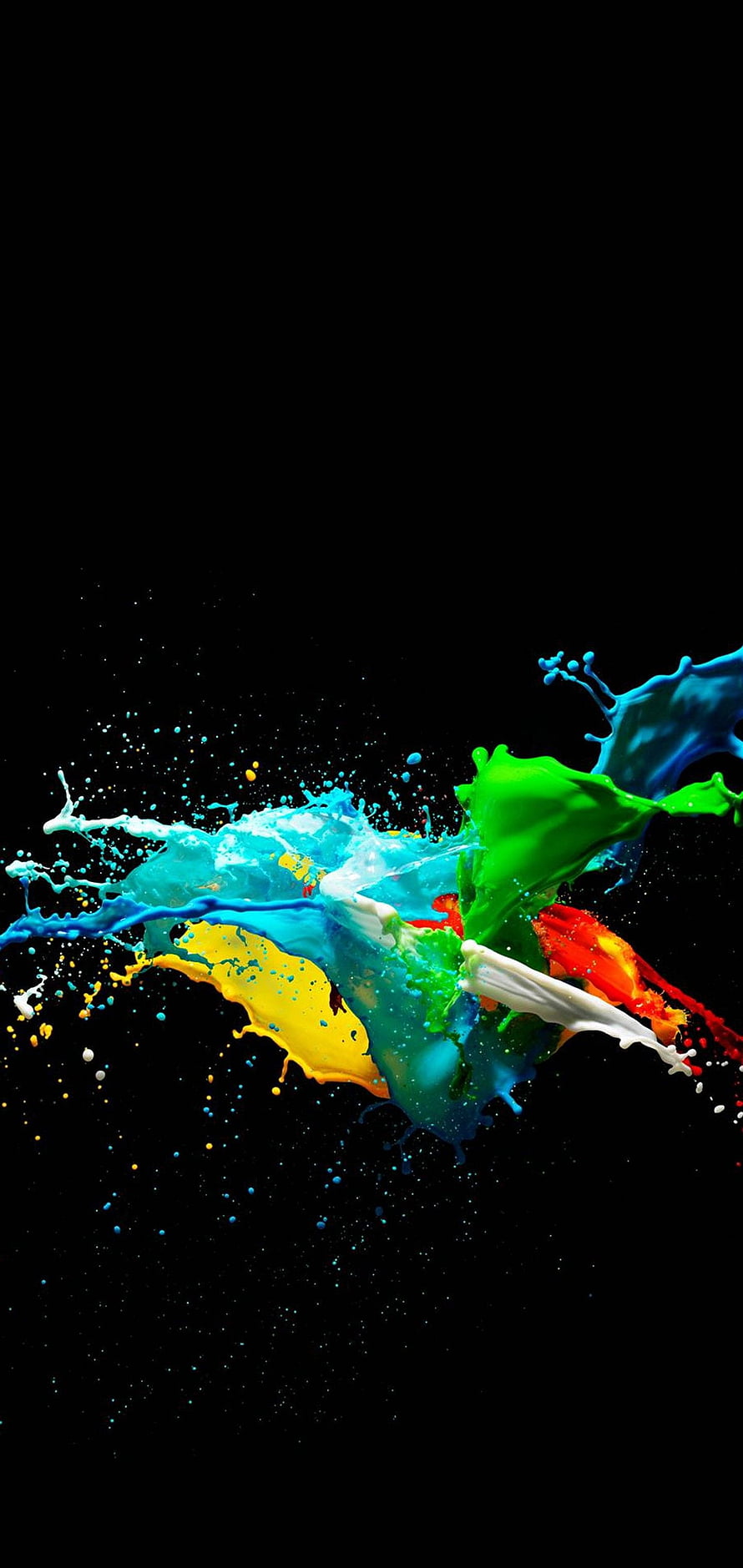 Vibrant multicolored paint splash frozen in motion against a deep black background HD phone wallpaper