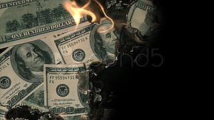 Burning US One Hundred Dollar Bills with Flames and Charred Edges HD wallpaper
